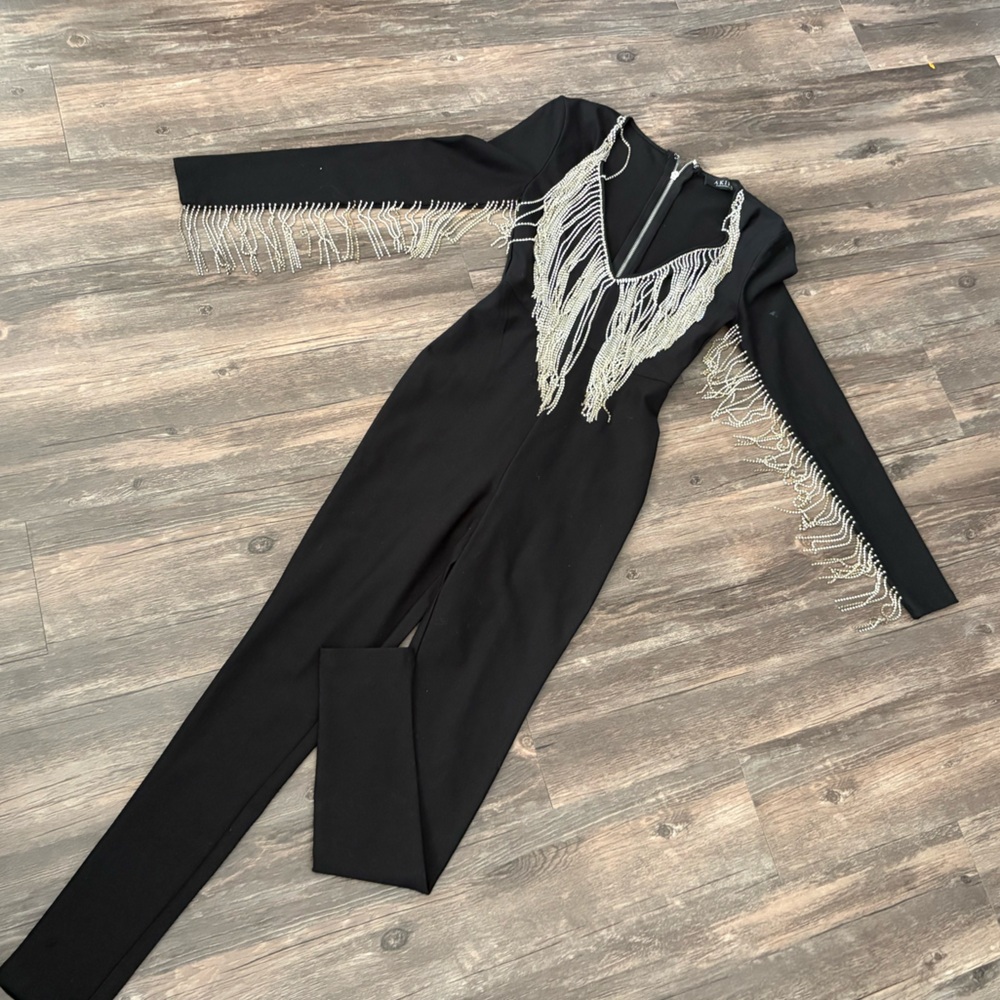 Akira Black Jumpsuit with Fringe Accents